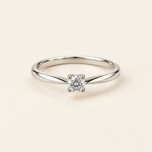 Silver gemstone ring on an ivory background